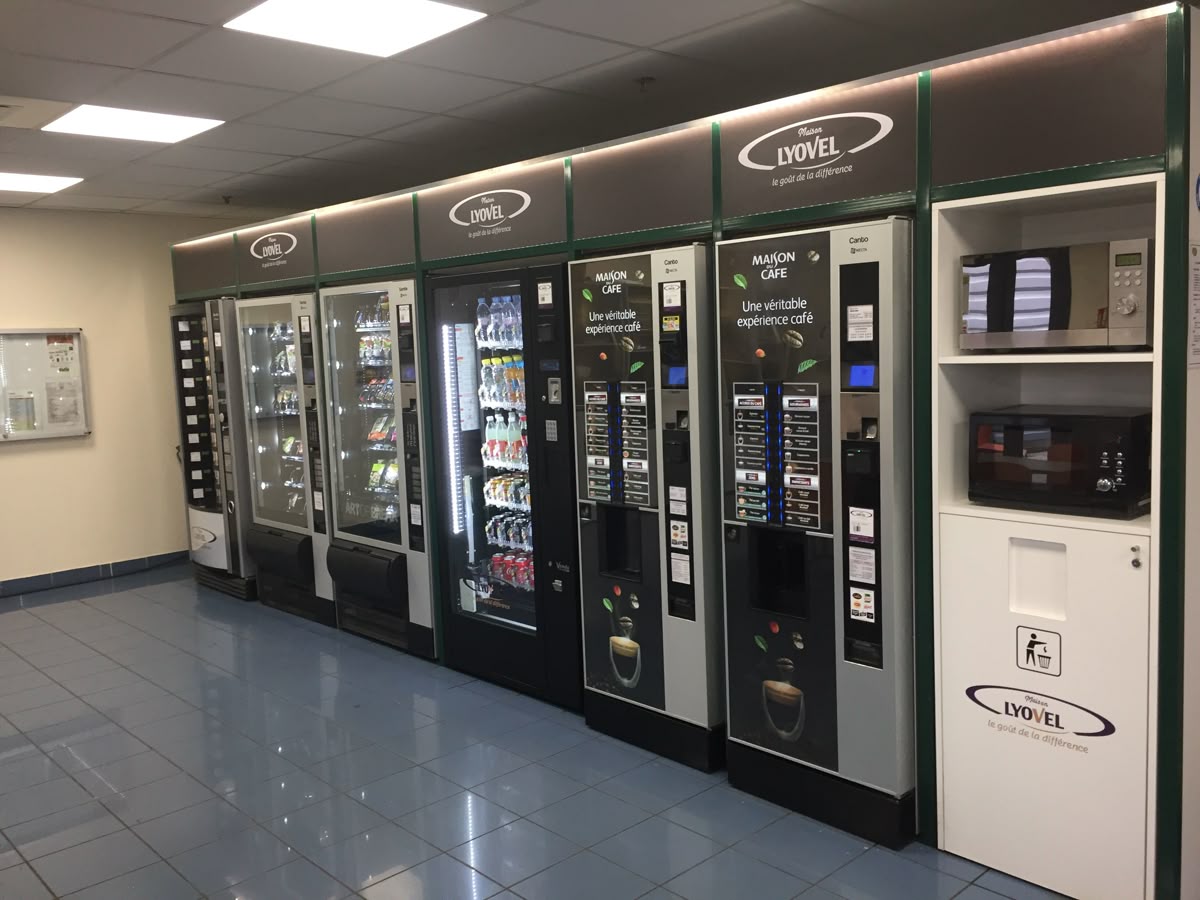 Vending machine for sale – row of refurbished black snack and drink vending machines